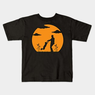 Father and Son Embracing Against the Sunset Kids T-Shirt